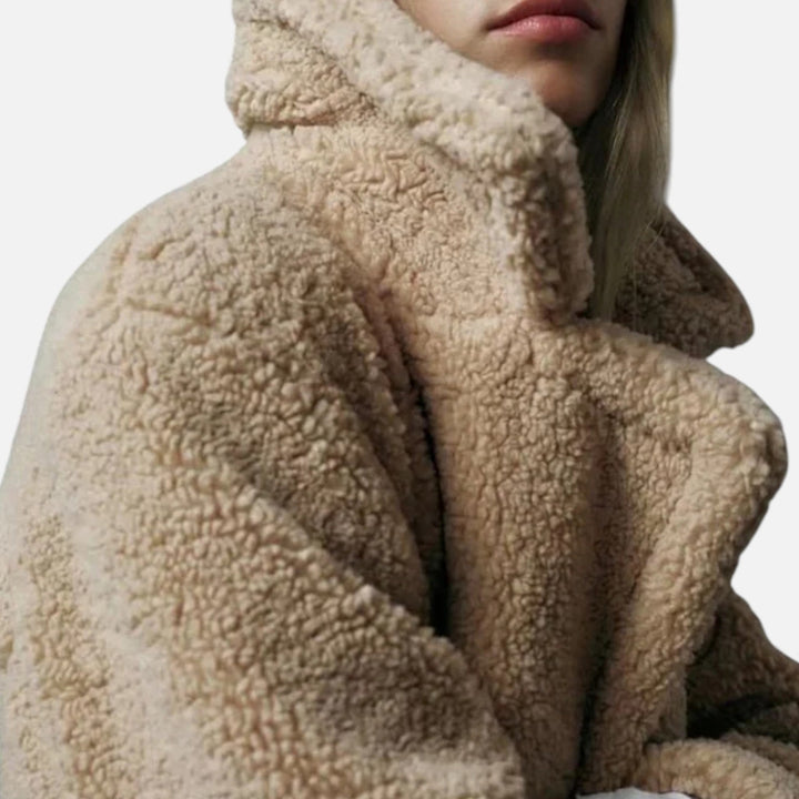 Dámský dlouhý kabát s dvojitým řaděním knoflíků z plyšového materiálu