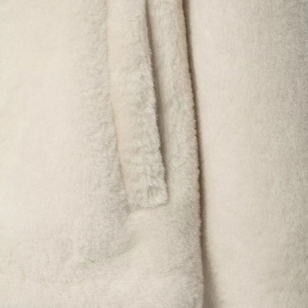 Damska kurtka z zatrzaskami i sztucznym futrem