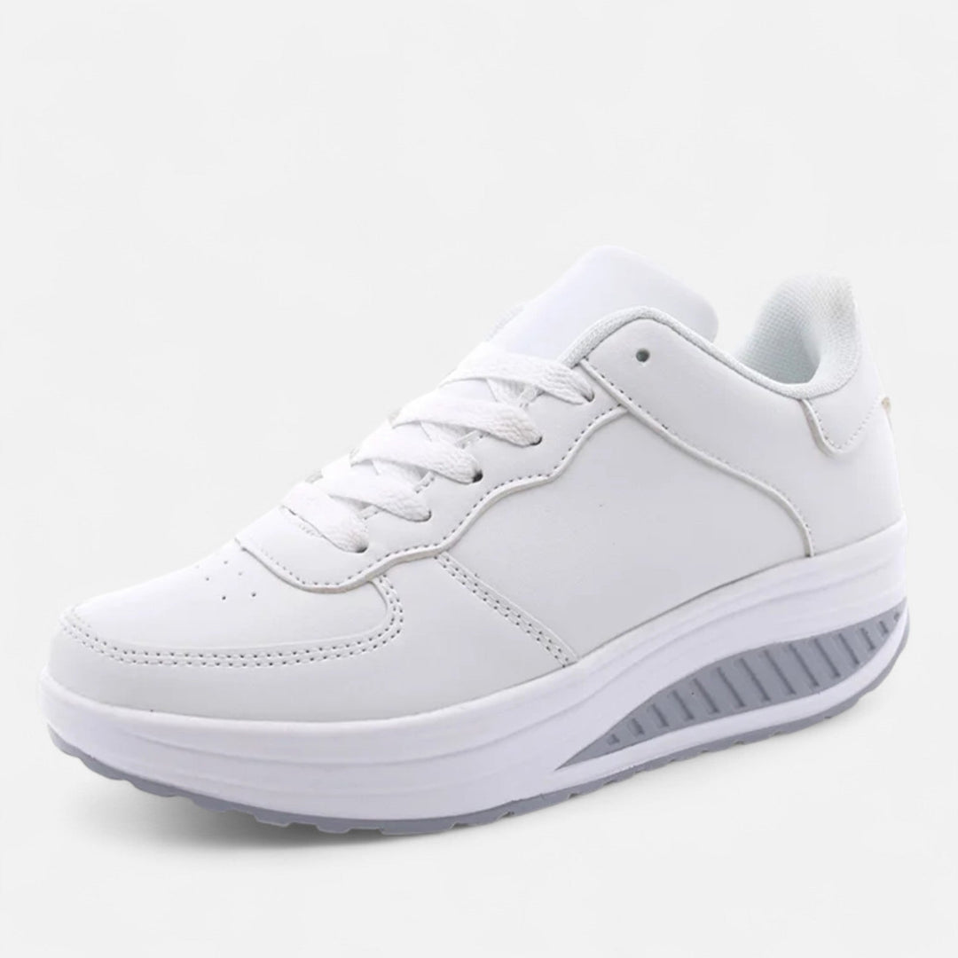 Dámské kožené tenisky na klínovém podpatku Édition Élégance