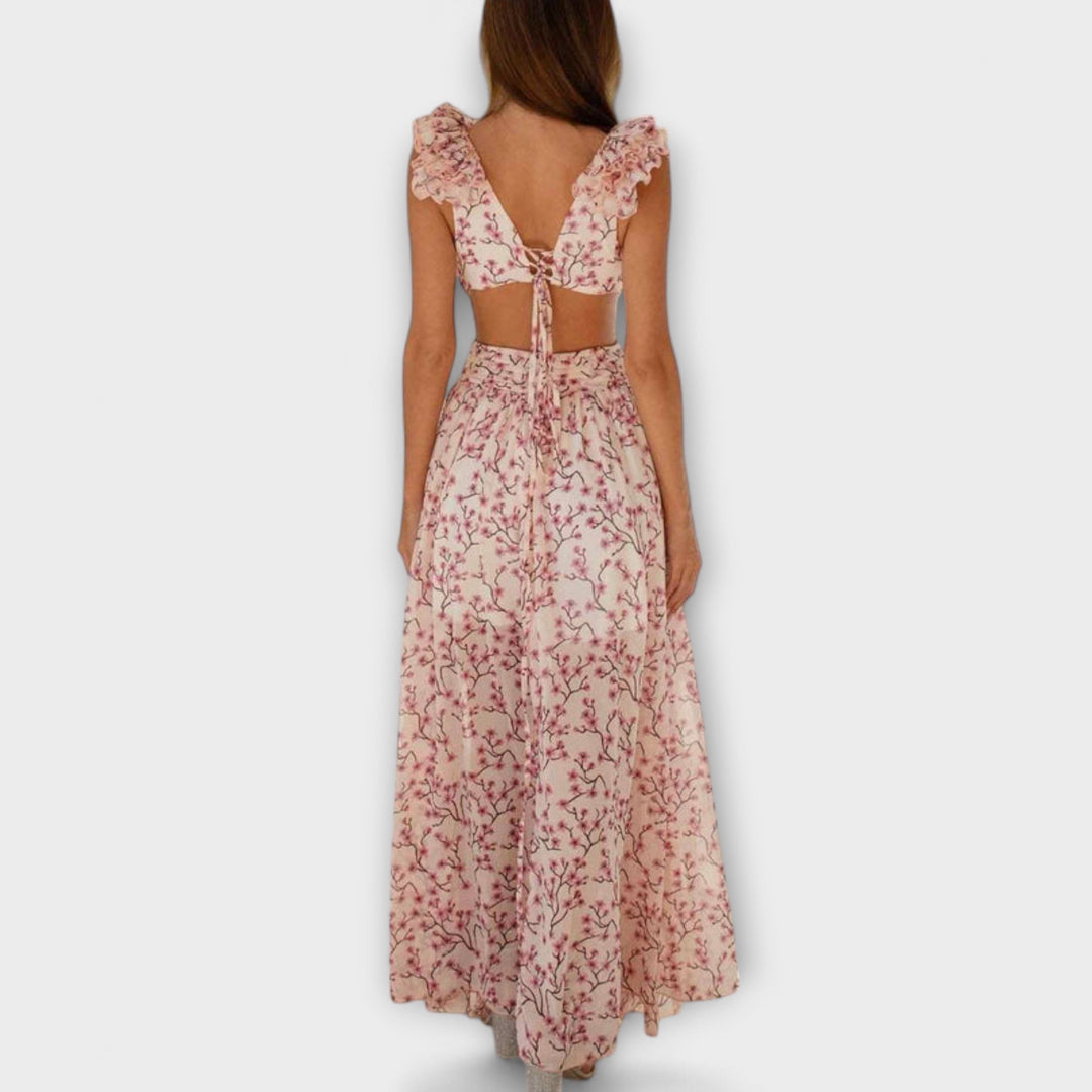 Robe longue avec ourlet à volants et détails découpés