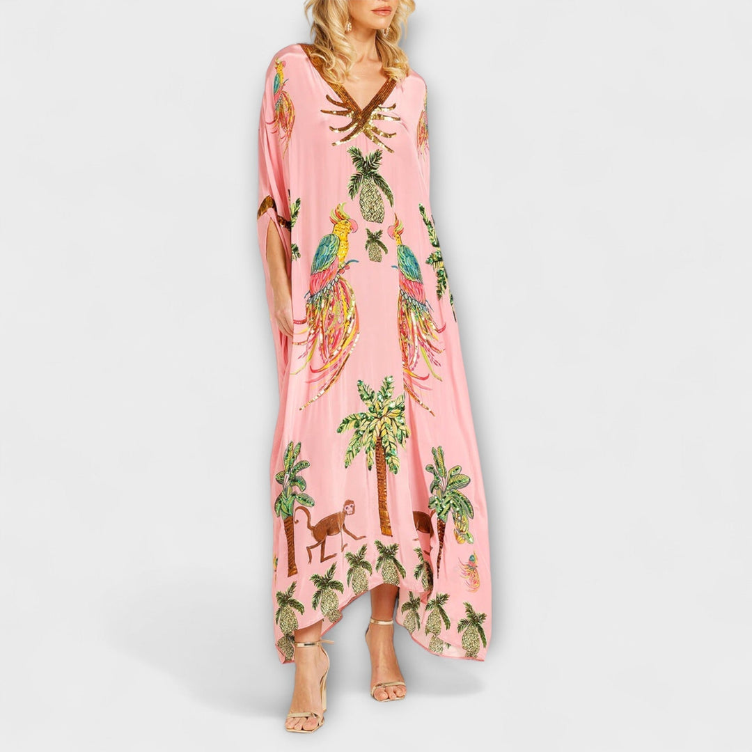 Robe accrocheuse aux épaules asymétriques et motif de cocotiers
