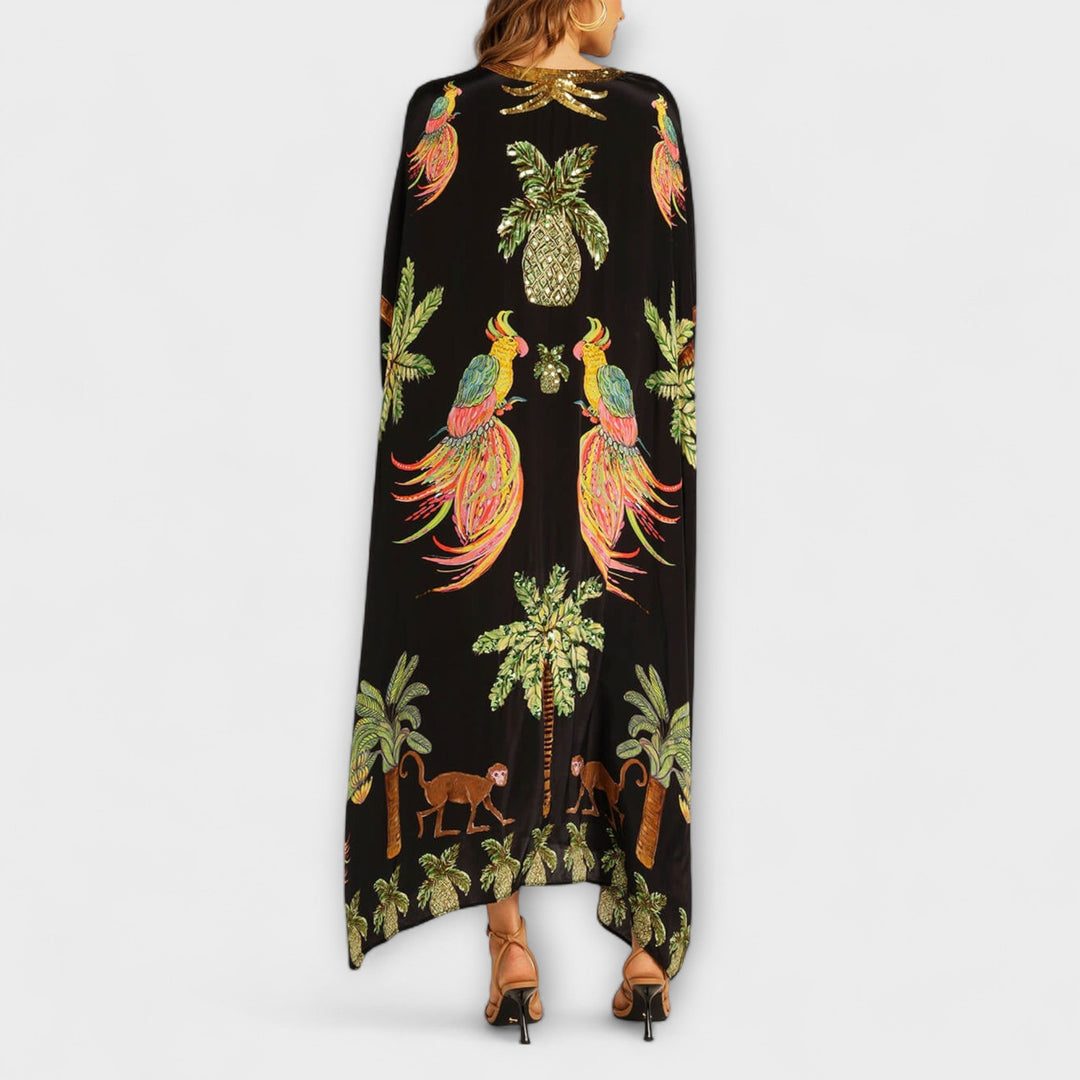 Robe accrocheuse aux épaules asymétriques et motif de cocotiers